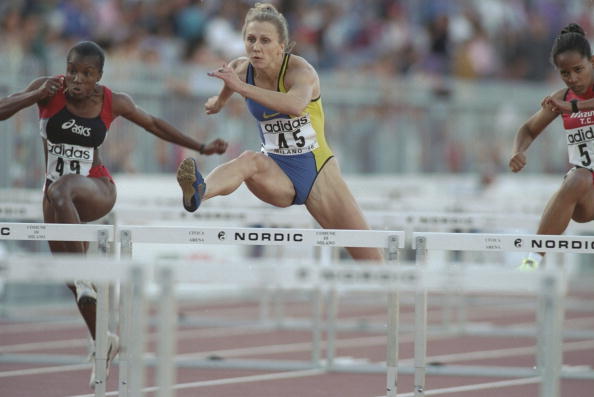 Ludmila Enquist of Sweden clears a hurdle in the 100 metres Hurdles event